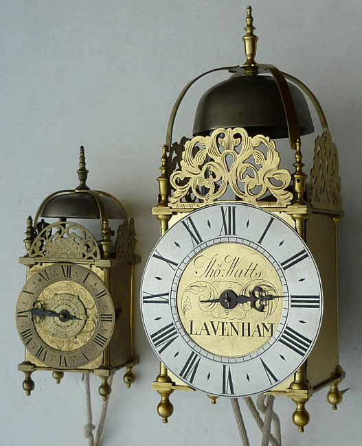 Rundell clock beside one of standard size