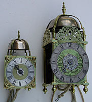 the miniature Trubshaw clock alongside one of standard size