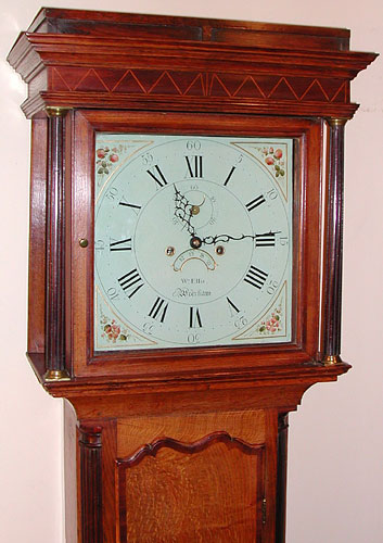 Eight-day longcase clock in oak with mahogany trim made c.1790 by William Ellis of Wrexham, Wales